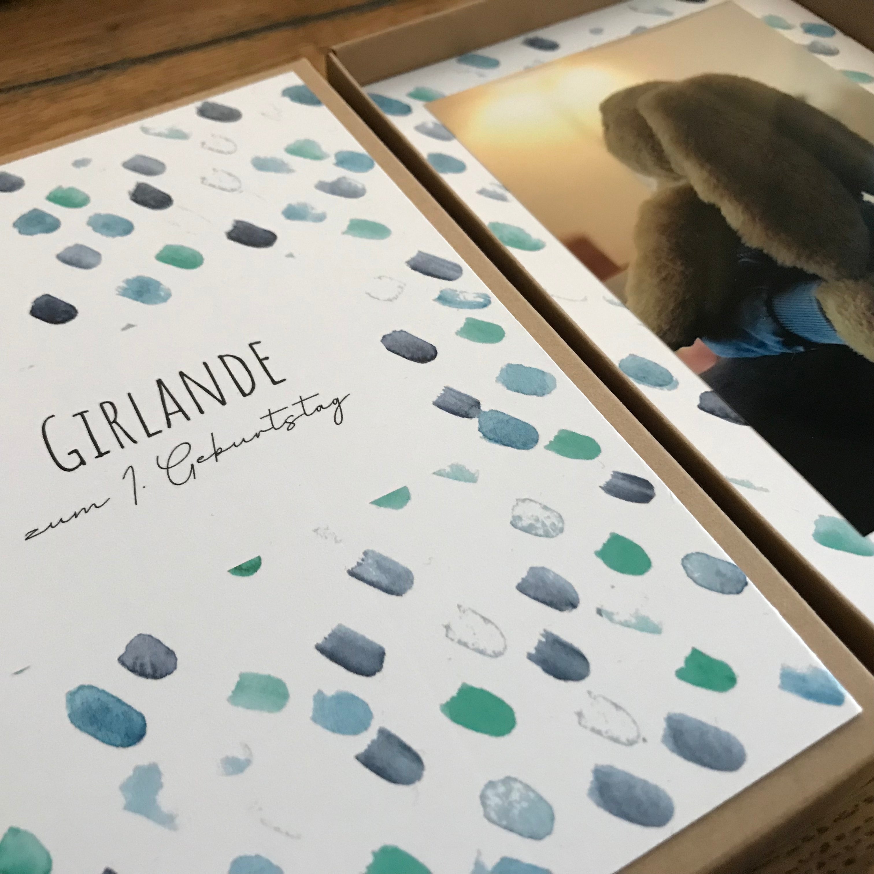 Fotogirlande zum 1. Geburtstag – Blaue Tupfer