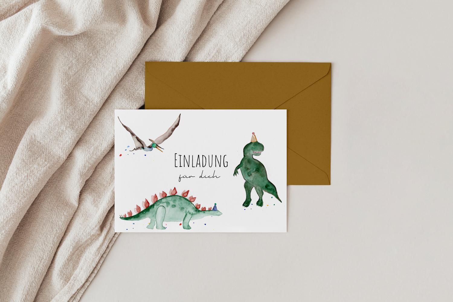 Dino-Einladungskarte für den Kindergeburtstag mit passendem Umschlag