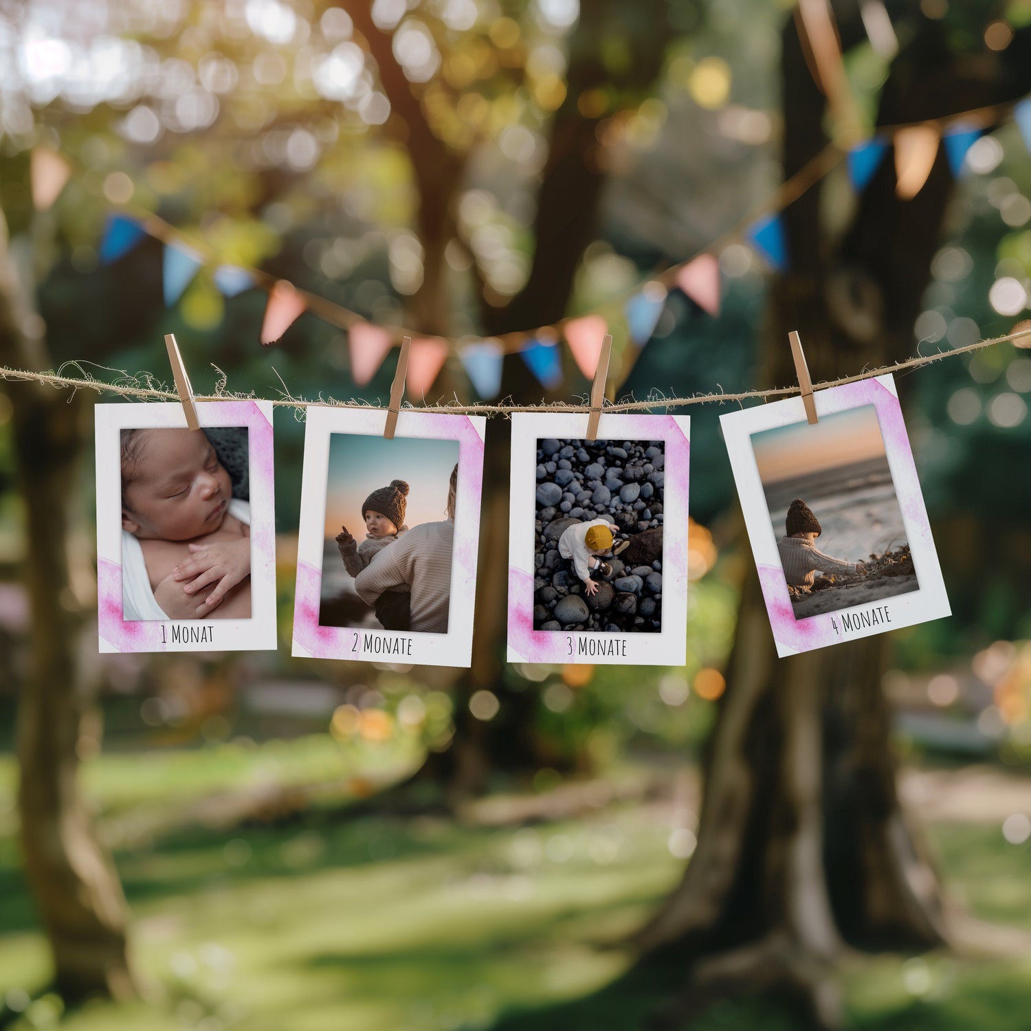 Handgemalte Fotogirlande in Rosa zum 1. Geburtstag mit Karten für jeden Lebensmonat.