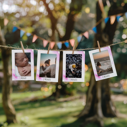 Handgemalte Fotogirlande in Rosa zum 1. Geburtstag mit Karten für jeden Lebensmonat.