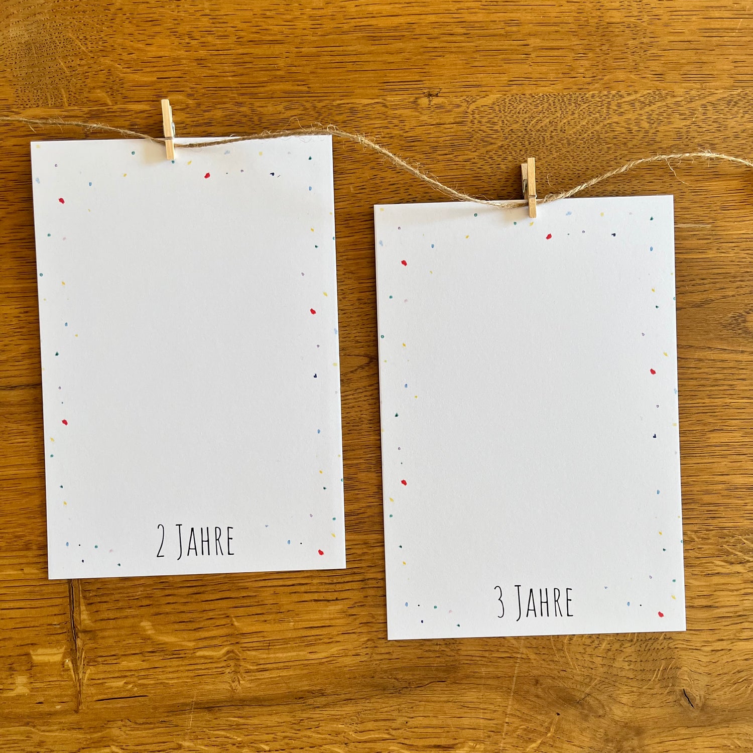 Hochwertig gedruckte Karten der Fotogirlande Farbspritzer auf festem Papier