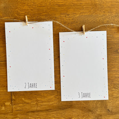 Hochwertig gedruckte Karten der Fotogirlande Farbspritzer auf festem Papier
